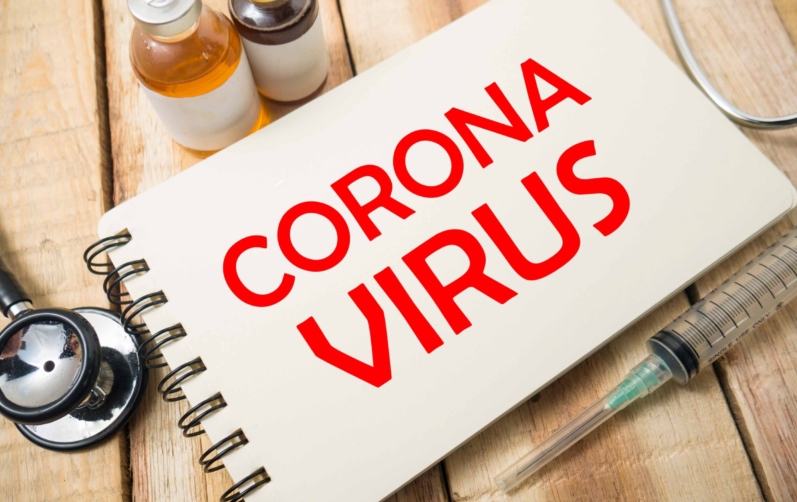 Anteckningsbok med texten Corona Virus