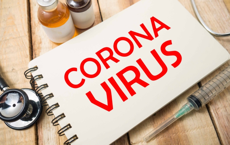 Anteckningsbok med texten Corona Virus