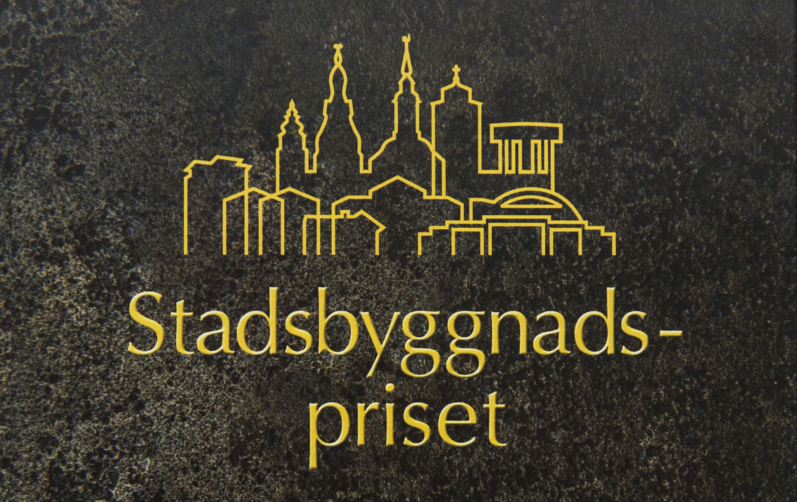 Plakett som vinnaren får fästa på sin byggnad
